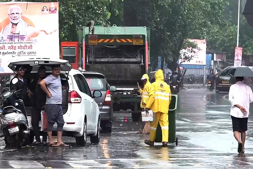 | Photo: PTI : Rains in Mumbai